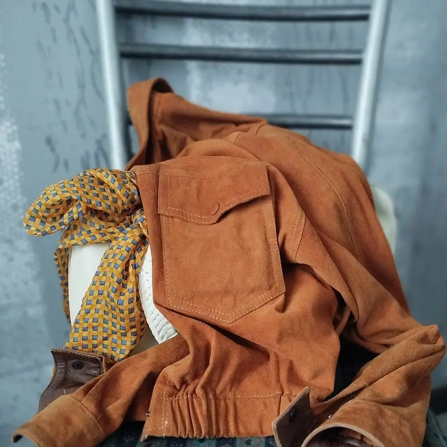 A suede jacket ready for leather cleaning